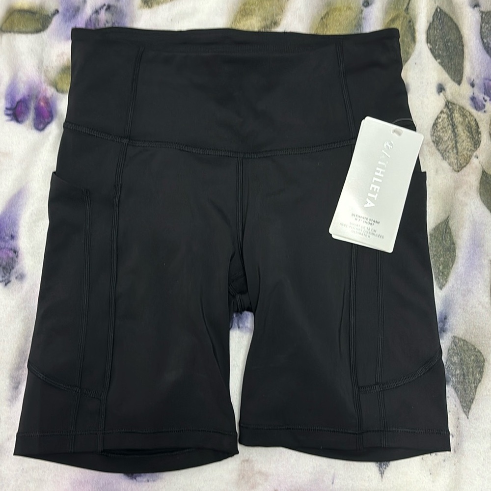 ATHLETA Ultimate stash II 7” short New size Small